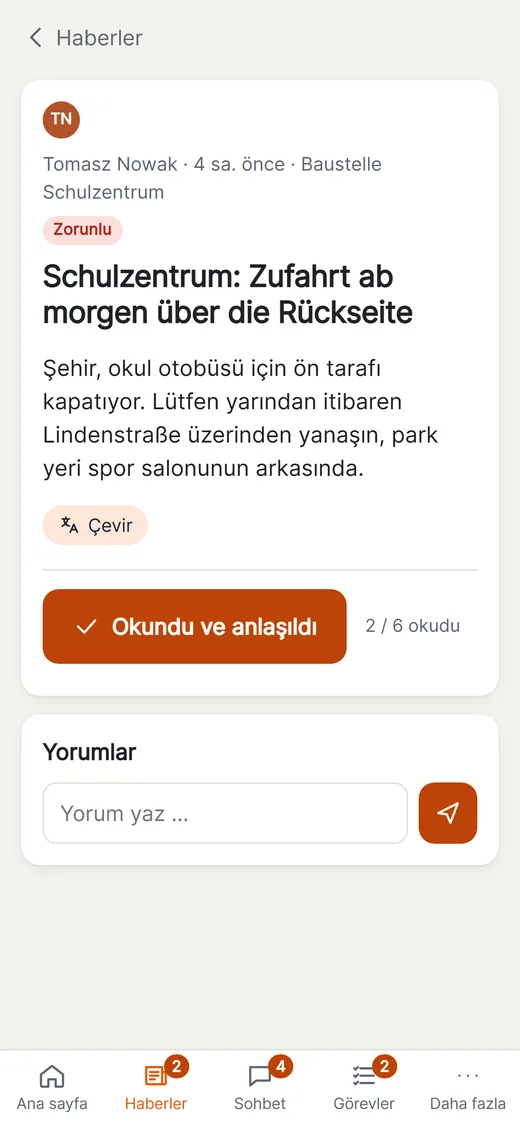 Mitarbeiter liest den Beitrag auf Türkisch und bestätigt „Gelesen und verstanden“